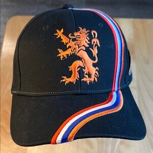 Black Baseball Cap with Orange Lion Embroidery and Tricolor Stripe